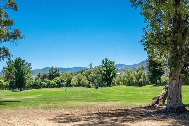 24754 Masters Cup Way, Valencia, CA 91355 - view of community featuring view of golf course, a mountain view, and a yard
