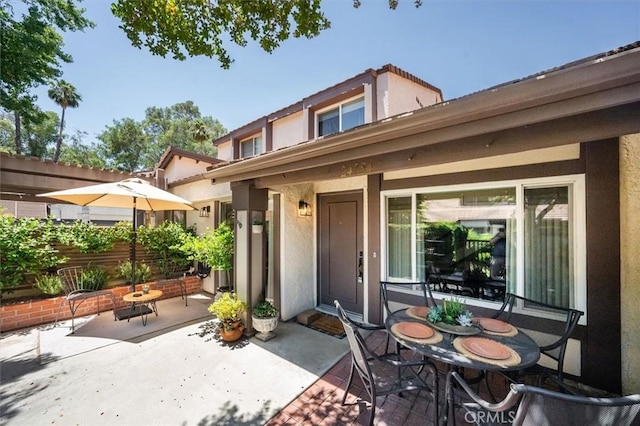 24754 Masters Cup Way, Valencia, CA 91355 - view of exterior entry featuring a patio and stucco siding