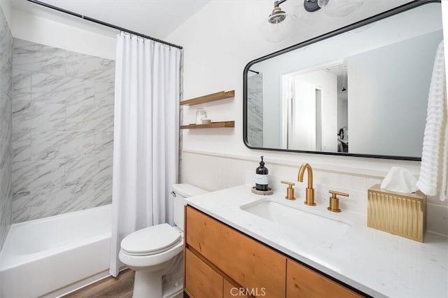 24754 Masters Cup Way, Valencia, CA 91355 - bathroom with vanity, shower / bath combo, and a wainscoted wall