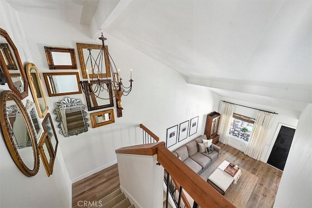 24754 Masters Cup Way, Valencia, CA 91355 - stairway featuring wood finished floors, a chandelier, and vaulted ceiling