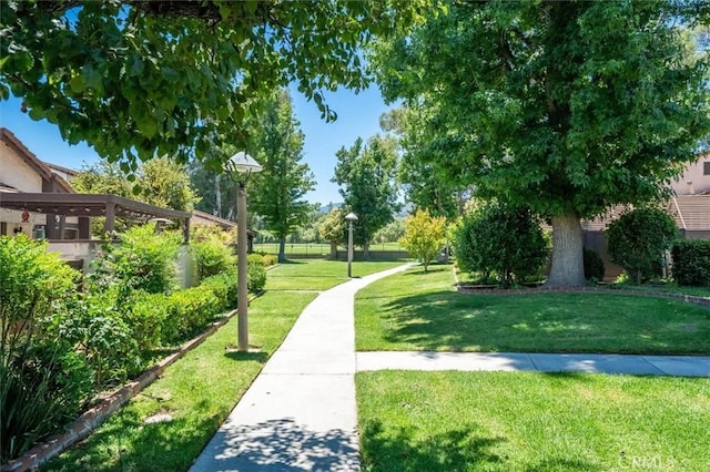 24754 Masters Cup Way, Valencia, CA 91355 - view of home's community with a yard