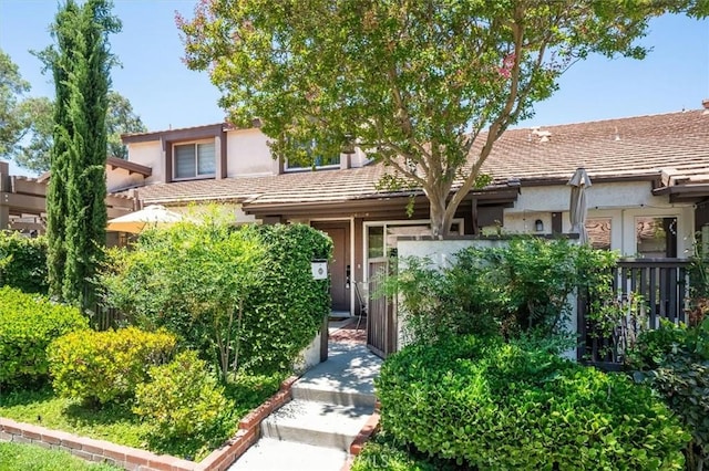 24754 Masters Cup Way, Valencia, CA 91355 - view of front of home featuring stucco siding