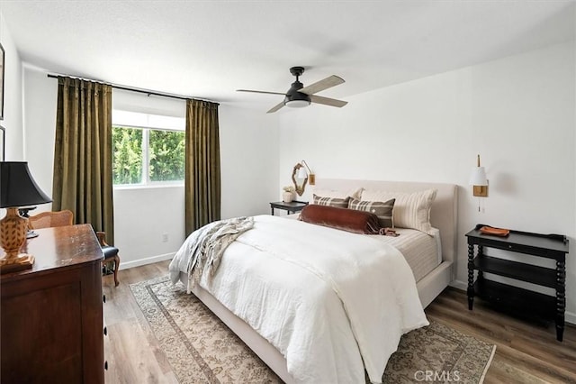 24754 Masters Cup Way, Valencia, CA 91355 - bedroom with light wood-style floors and a ceiling fan