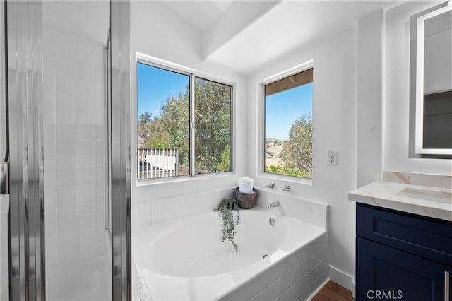 827 La Cadena Ln, Corona, CA 92879 - full bath with vanity, a bath, and a shower stall