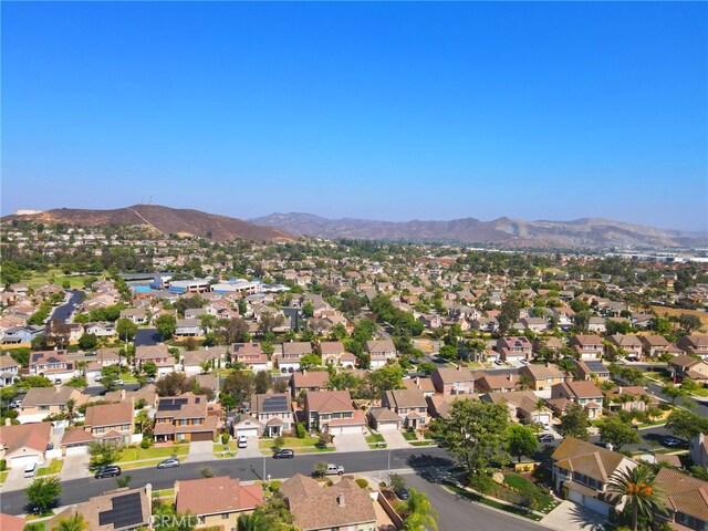 827 La Cadena Ln, Corona, CA 92879 - aerial view of property's location featuring mountains and nearby suburban area
