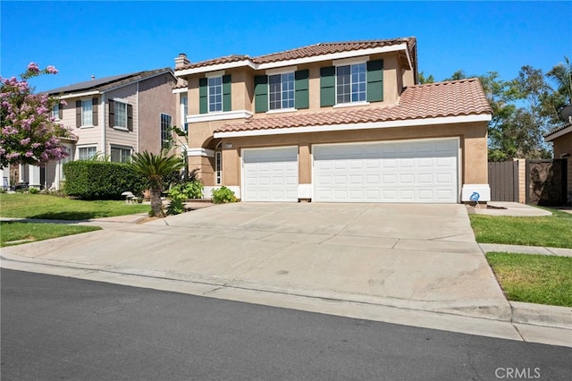 827 La Cadena Ln, Corona, CA 92879 - view of front facade featuring stucco siding, a tiled roof, concrete driveway, and a garage