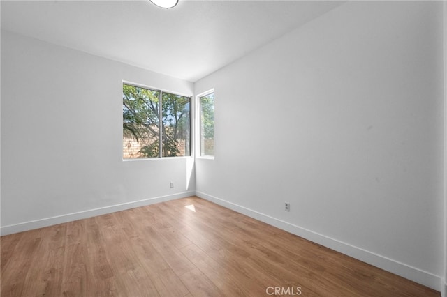 827 La Cadena Ln, Corona, CA 92879 - unfurnished room featuring baseboards and light wood-style flooring