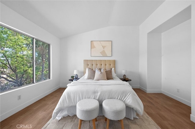827 La Cadena Ln, Corona, CA 92879 - bedroom featuring lofted ceiling and wood finished floors