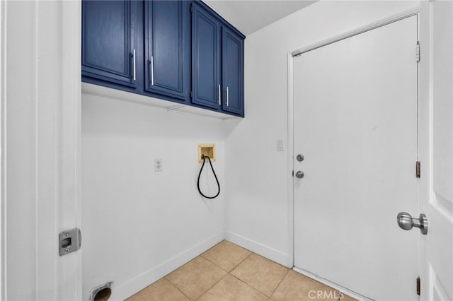 827 La Cadena Ln, Corona, CA 92879 - laundry area featuring hookup for a washing machine, cabinet space, and light tile patterned floors