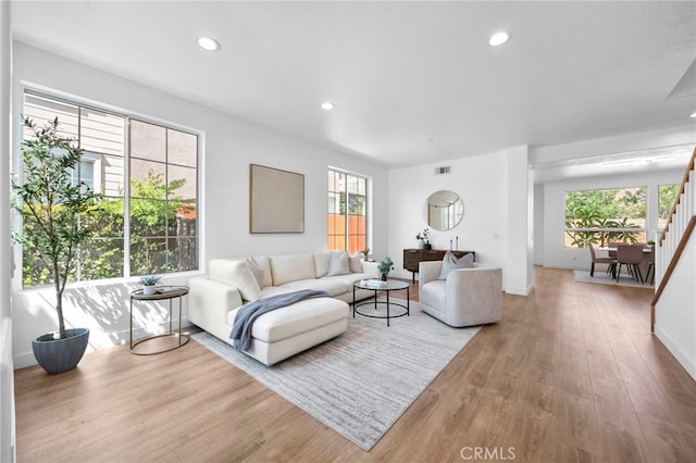 827 La Cadena Ln, Corona, CA 92879 - living room featuring wood finished floors, stairway, and recessed lighting