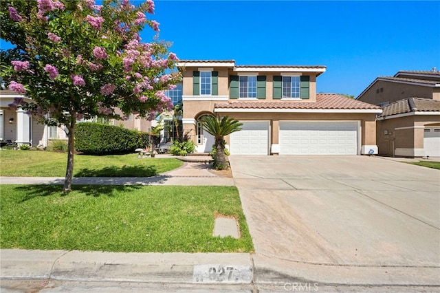 827 La Cadena Ln, Corona, CA 92879 - view of front of house featuring stucco siding, concrete driveway, a tile roof, and a front yard