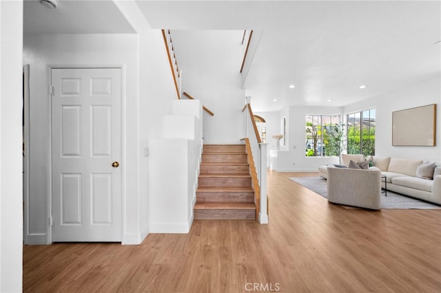 827 La Cadena Ln, Corona, CA 92879 - stairs featuring wood finished floors and recessed lighting