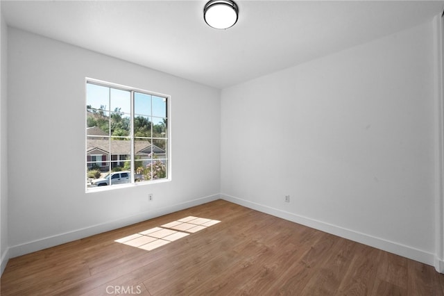 827 La Cadena Ln, Corona, CA 92879 - empty room featuring wood finished floors