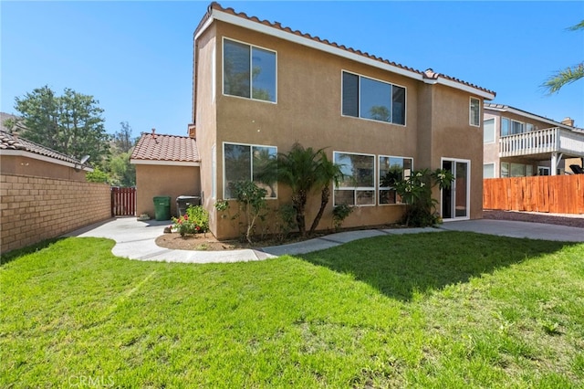 827 La Cadena Ln, Corona, CA 92879 - rear view of house with stucco siding, a tile roof, and a patio
