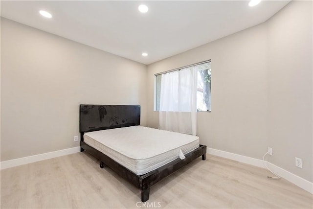 29 Stanford Ct Unit 93, Irvine, CA 92612 - bedroom with light wood finished floors and recessed lighting