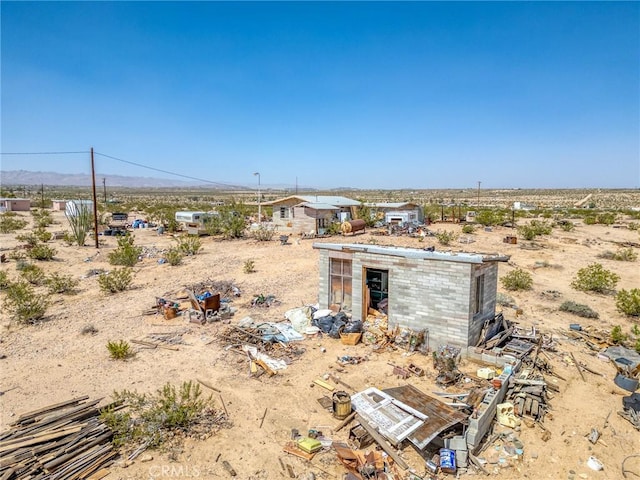 72082 Winters Rd Unit 29, Palms, CA 92277 - view of yard with view of desert landscape, a mountain view, and a rural view