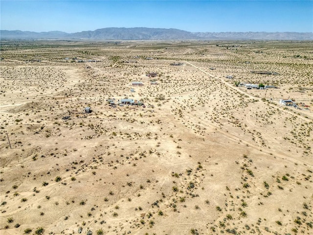 72082 Winters Rd Unit 29, Palms, CA 92277 - aerial view of sparsely populated area featuring a desert landscape and a mountain backdrop