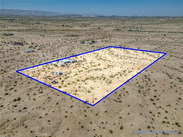 72082 Winters Rd Unit 29, Palms, CA 92277 - aerial view of sparsely populated area featuring a desert landscape and property parcel outlined