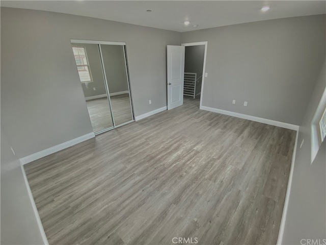 6545 Newlin, Whittier, CA 90601 - unfurnished bedroom featuring wood finished floors, a closet, and recessed lighting