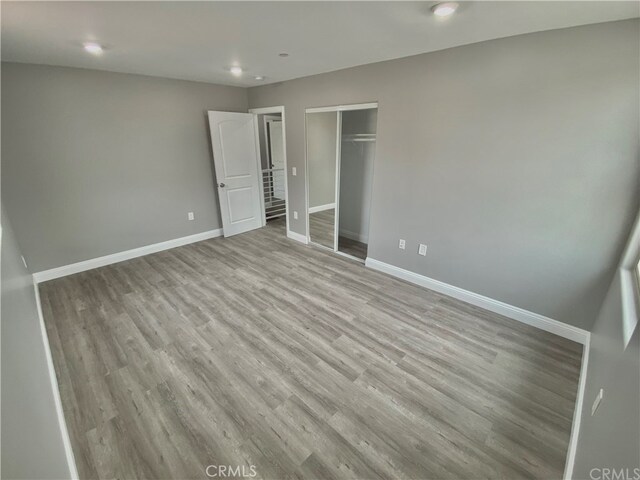 6545 Newlin, Whittier, CA 90601 - unfurnished bedroom with wood finished floors, a closet, and recessed lighting