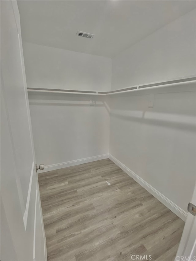 6545 Newlin, Whittier, CA 90601 - spacious closet featuring light wood finished floors