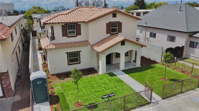 6545 Newlin, Whittier, CA 90601 - view of front of home with a tile roof, stucco siding, and a fenced backyard