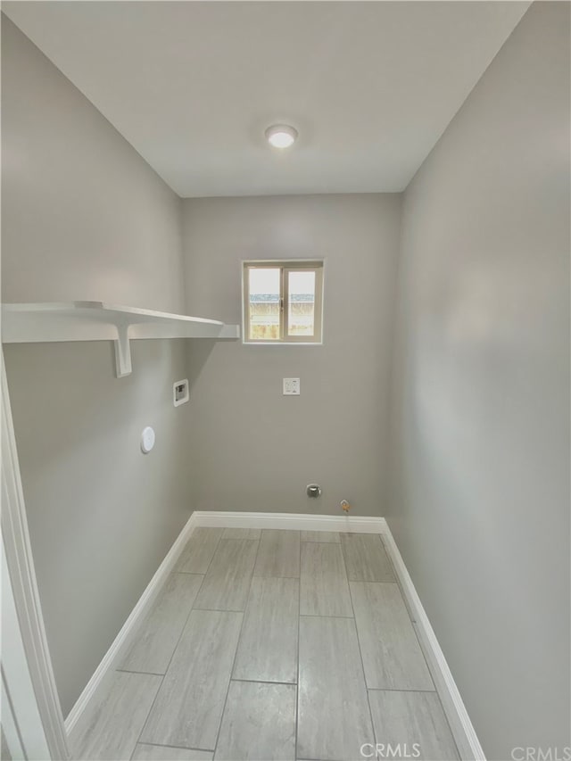 6545 Newlin, Whittier, CA 90601 - washroom featuring gas dryer hookup, hookup for a washing machine, and light wood-style floors
