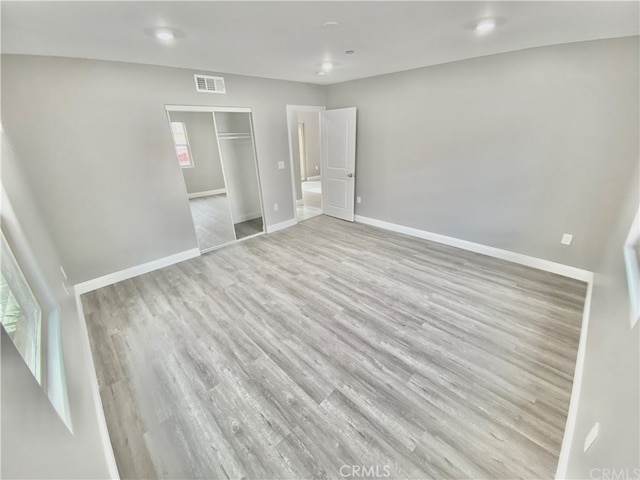 6545 Newlin, Whittier, CA 90601 - unfurnished bedroom featuring wood finished floors, a closet, and recessed lighting