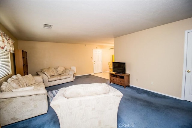 21295 Wisteria St, Apple Valley, CA 92308 - living room featuring dark carpet and baseboards