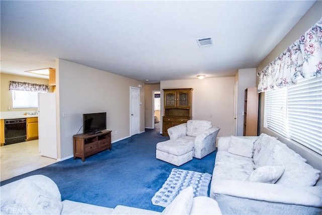 21295 Wisteria St, Apple Valley, CA 92308 - living room with light carpet and baseboards