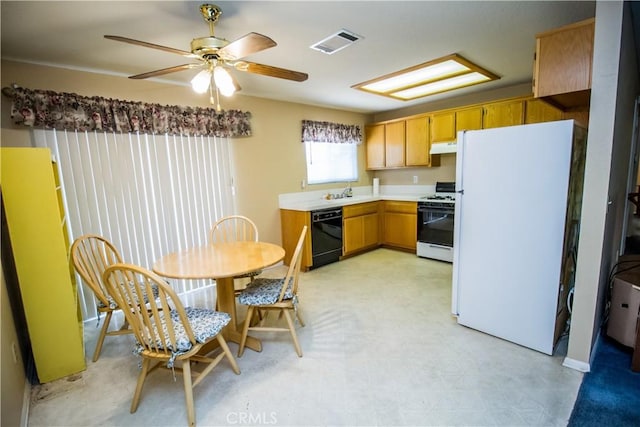 21295 Wisteria St, Apple Valley, CA 92308 - kitchen with white appliances, light countertops, light flooring, ceiling fan, and ventilation hood