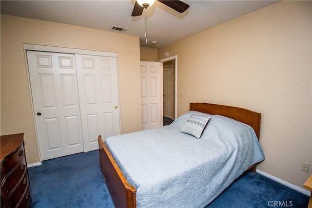 21295 Wisteria St, Apple Valley, CA 92308 - bedroom featuring dark colored carpet, a closet, and a ceiling fan
