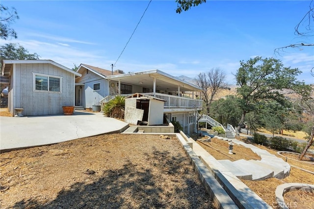 501 Old State Rd, Wofford Heights, CA 93285 - rear view of house with a patio, stairs, and driveway
