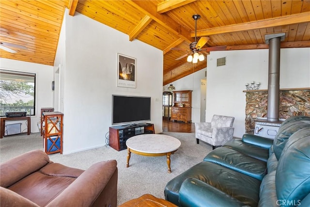 501 Old State Rd, Wofford Heights, CA 93285 - carpeted living area featuring a wood ceiling with exposed beams, a ceiling fan, a wood stove, and high vaulted ceiling