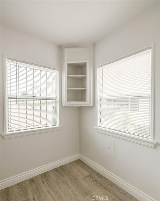 473 W 17th St, San Pedro, CA 90731 - spare room with light wood-style floors and baseboards