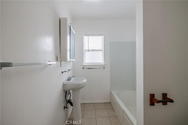 473 W 17th St, San Pedro, CA 90731 - full bathroom with a bathtub and tile patterned floors
