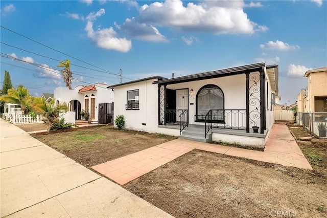 473 W 17th St, San Pedro, CA 90731 - view of front facade with a porch and stucco siding