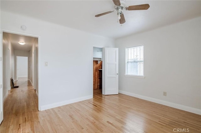 473 W 17th St, San Pedro, CA 90731 - unfurnished bedroom featuring light wood-style flooring and a ceiling fan