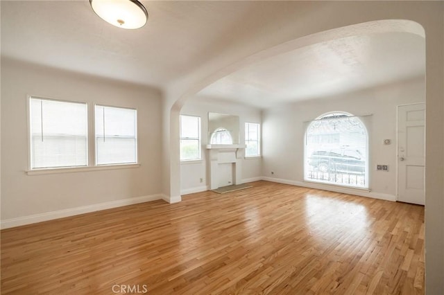 473 W 17th St, San Pedro, CA 90731 - foyer with arched walkways and light wood-type flooring