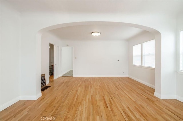 473 W 17th St, San Pedro, CA 90731 - unfurnished room featuring light wood-style flooring and arched walkways