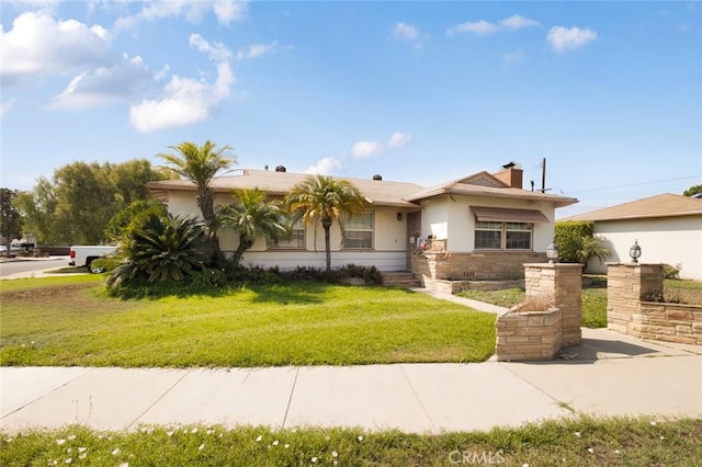 6837 Boer Ave, Whittier, CA 90606 - view of front of house with stucco siding, a front lawn, stone siding, and a chimney