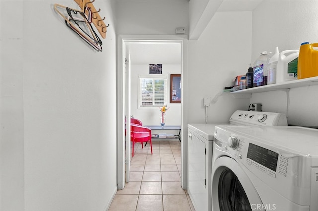 16116 Cajon, Hesperia, CA 92345 - laundry area with washing machine and clothes dryer and light tile patterned floors