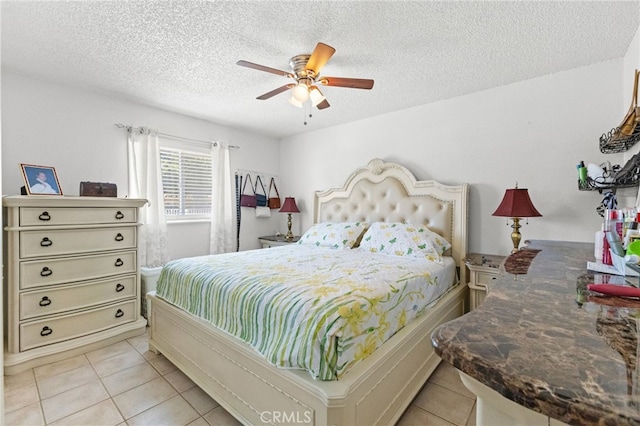 16116 Cajon, Hesperia, CA 92345 - bedroom with light tile patterned floors, a textured ceiling, and a ceiling fan