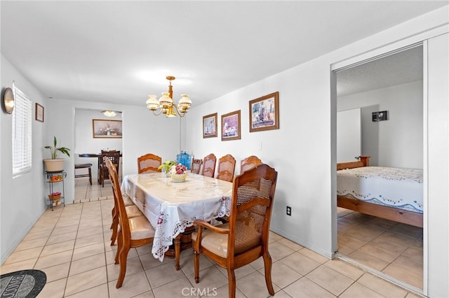 16116 Cajon, Hesperia, CA 92345 - dining room featuring a chandelier and light tile patterned floors