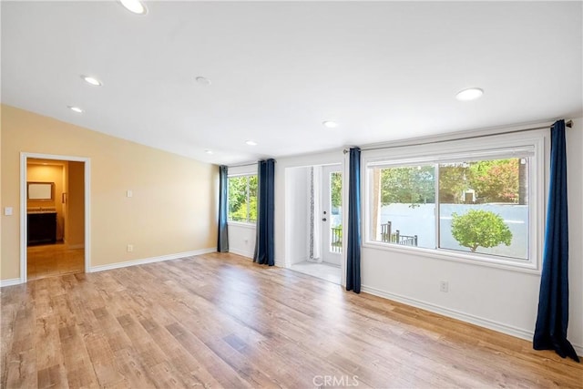 17211 Orozco St, Granada Hills, CA 91344 - empty room featuring light wood-style floors and recessed lighting