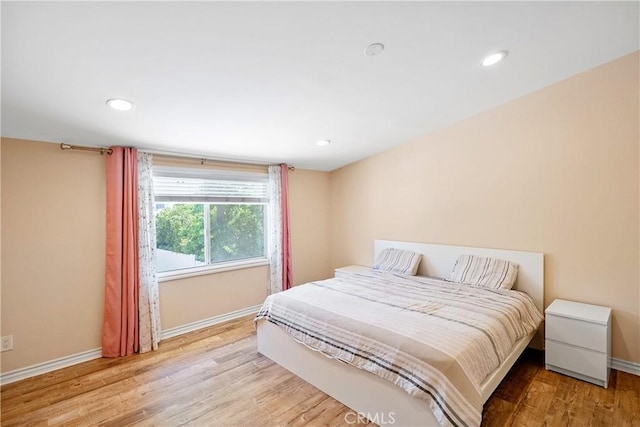 17211 Orozco St, Granada Hills, CA 91344 - bedroom featuring wood finished floors and recessed lighting