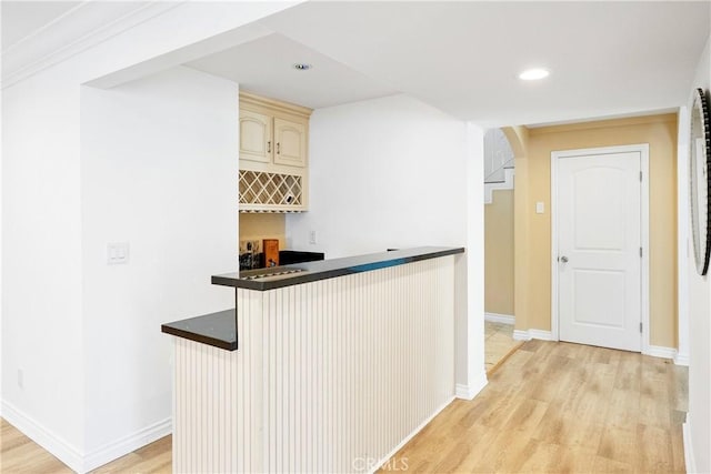 17211 Orozco St, Granada Hills, CA 91344 - indoor bar with light wood finished floors, arched walkways, and recessed lighting