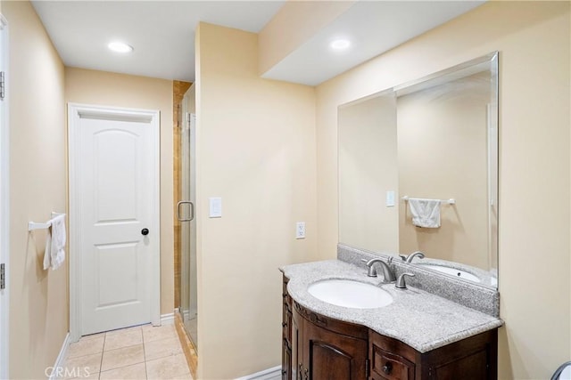 17211 Orozco St, Granada Hills, CA 91344 - full bath featuring vanity, a shower stall, tile patterned floors, and recessed lighting