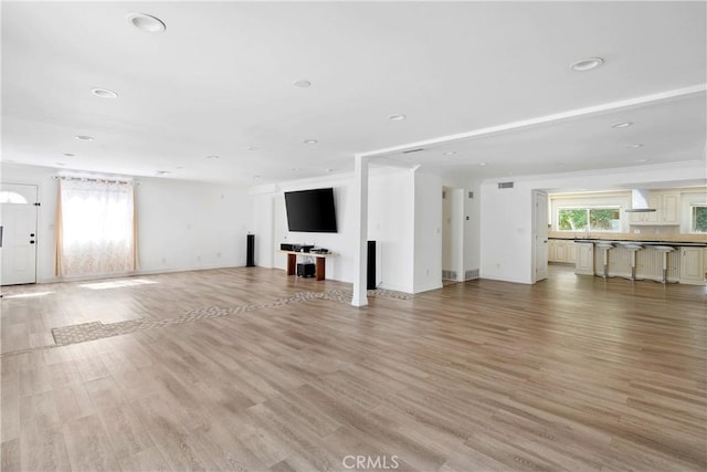 17211 Orozco St, Granada Hills, CA 91344 - unfurnished living room featuring light wood finished floors and recessed lighting