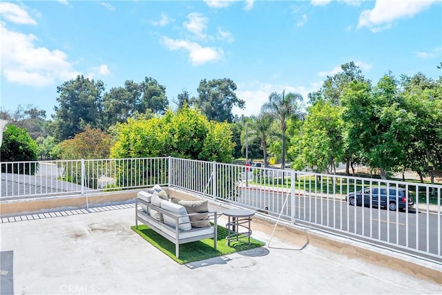 17211 Orozco St, Granada Hills, CA 91344 - view of patio / terrace with an outdoor hangout area and view of wooded area